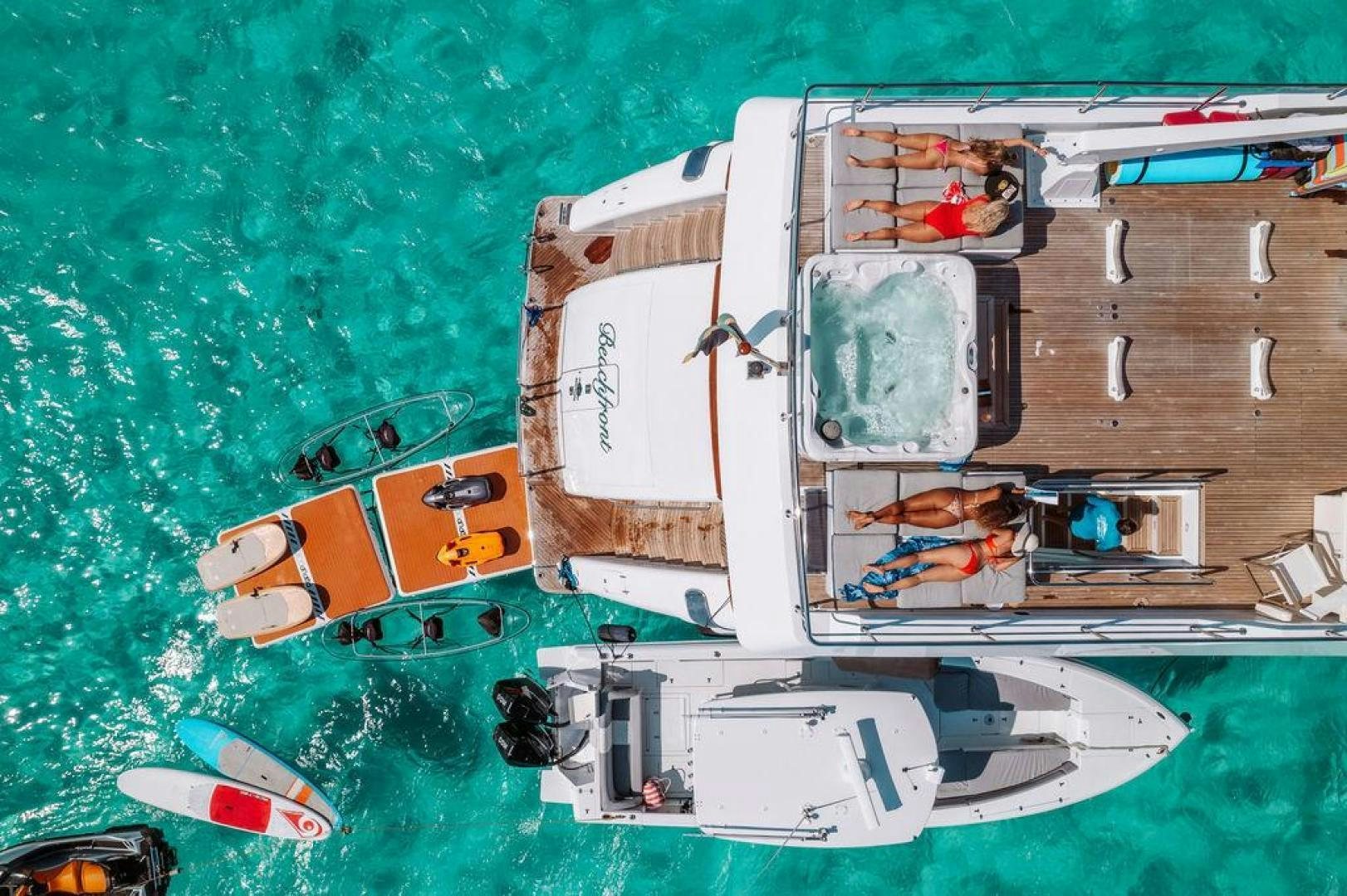 a boat on the water aboard BEACHFRONT Yacht for Sale