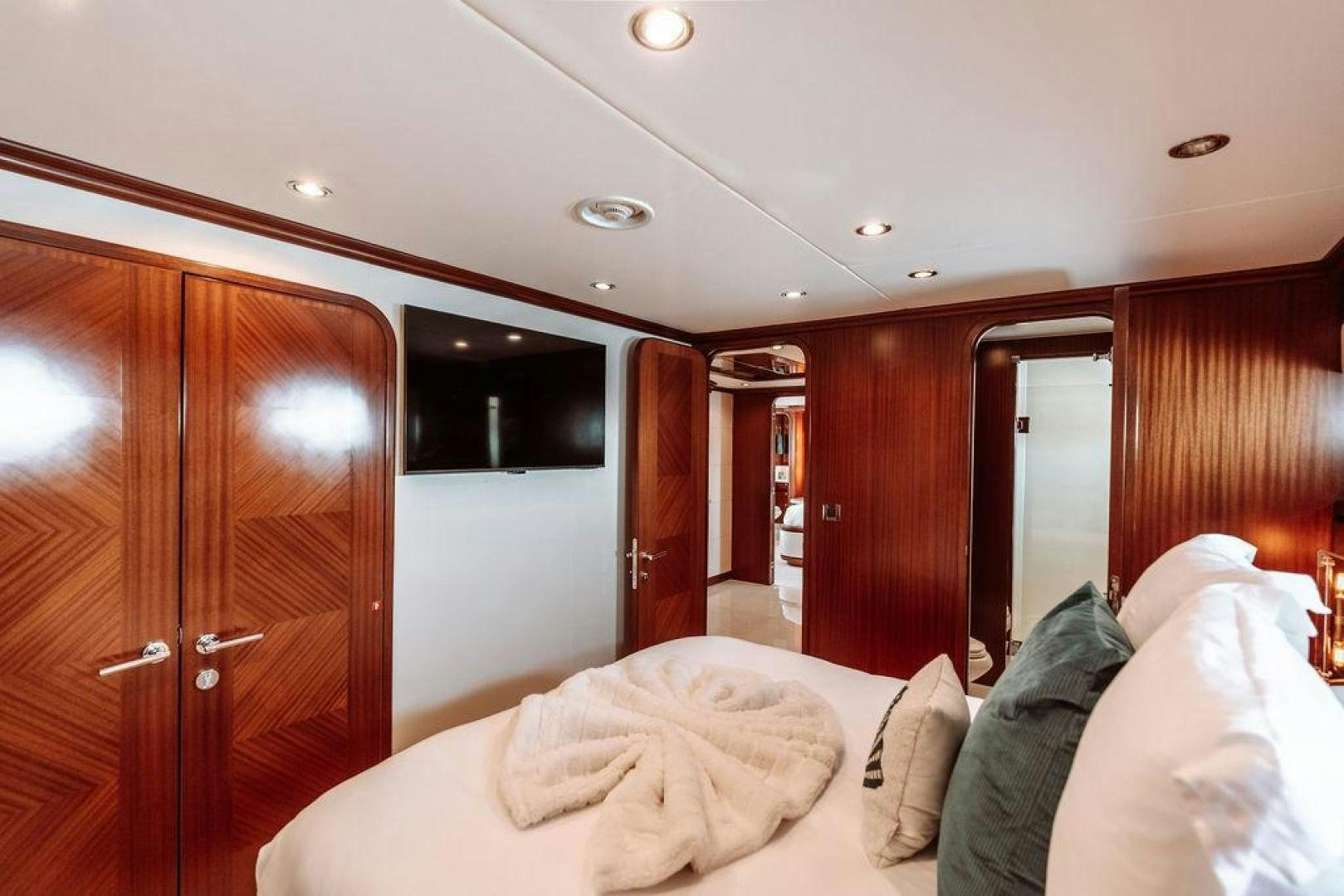 a bed in a room aboard BEACHFRONT Yacht for Sale