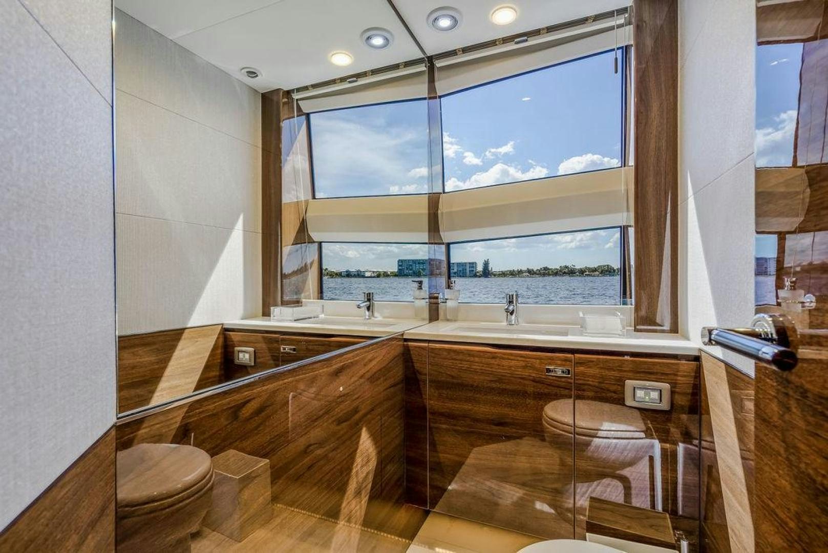 a bathroom with a large mirror aboard HIDEOUT Yacht for Sale
