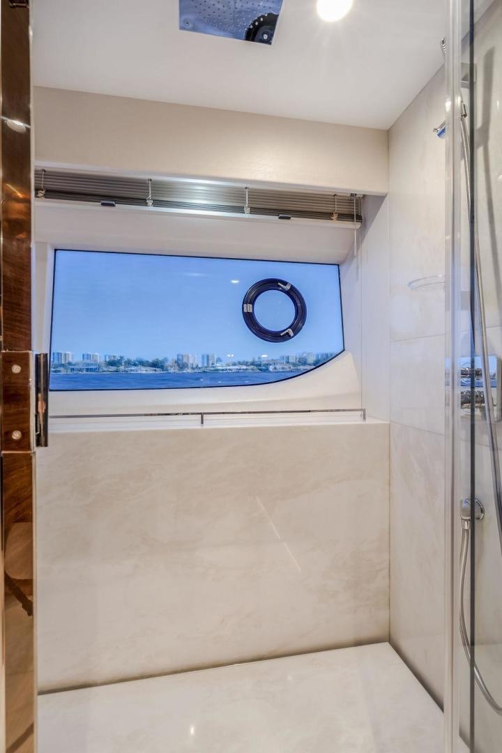 a rectangular blue sign on a wall aboard HIDEOUT Yacht for Sale