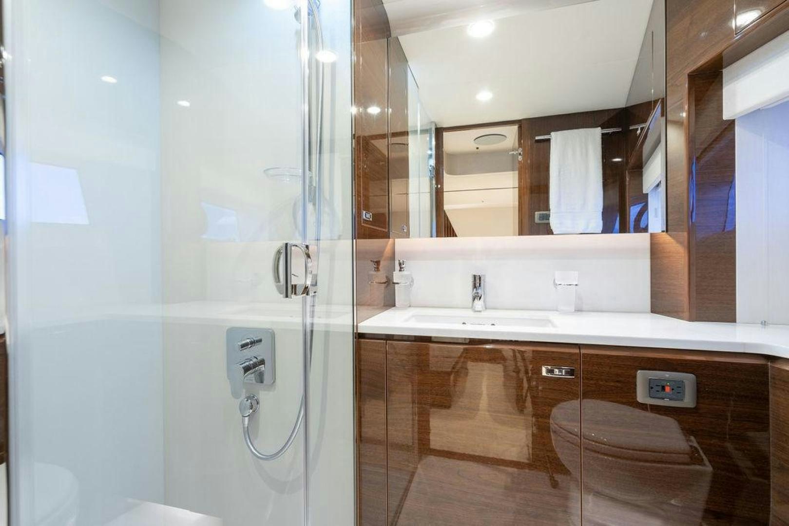 a bathroom with a large mirror aboard HIDEOUT Yacht for Sale