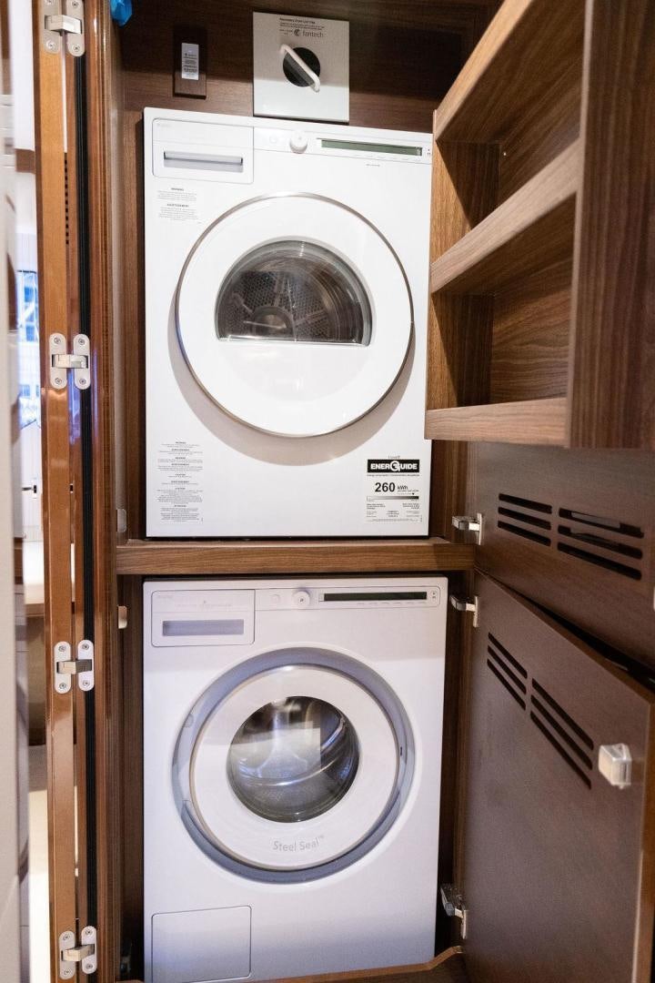 a white washing machine aboard HIDEOUT Yacht for Sale