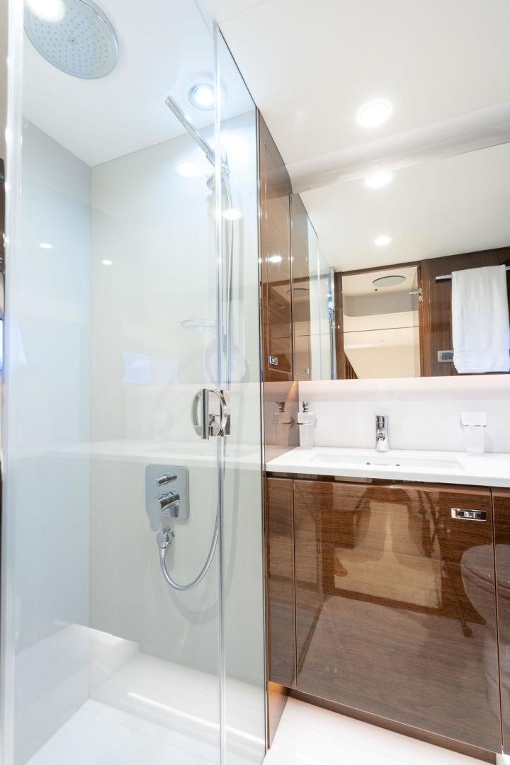 a bathroom with a shower unit aboard HIDEOUT Yacht for Sale