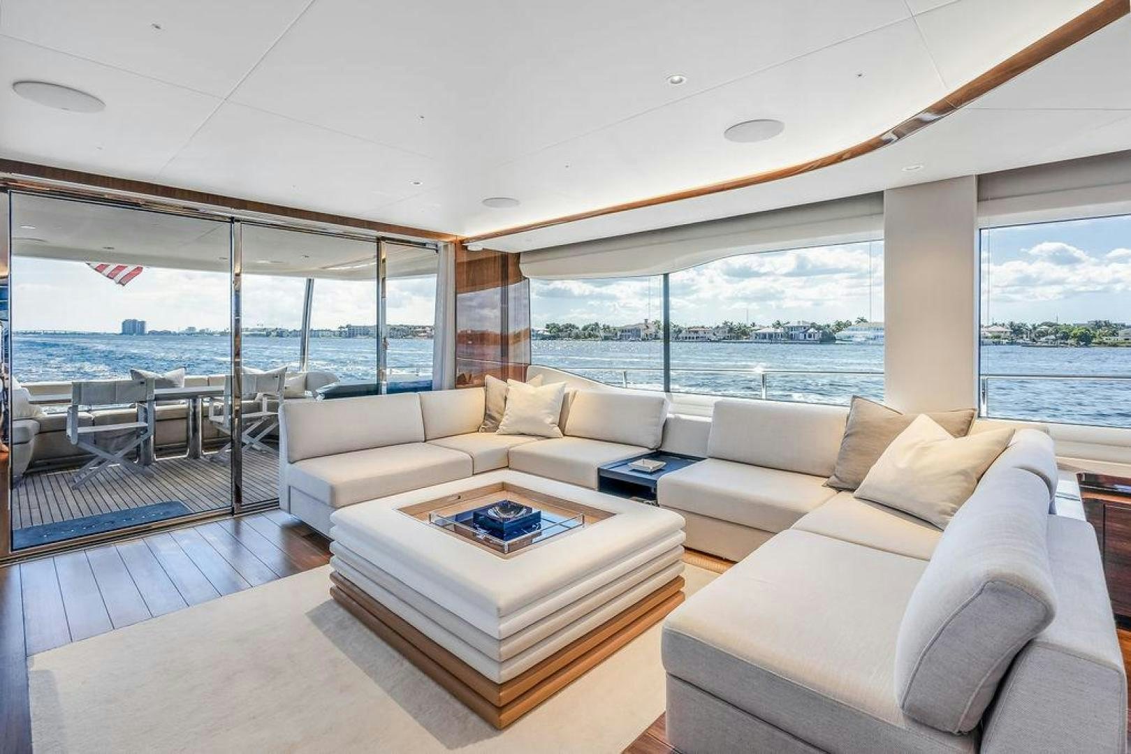 a living room with a large window aboard HIDEOUT Yacht for Sale