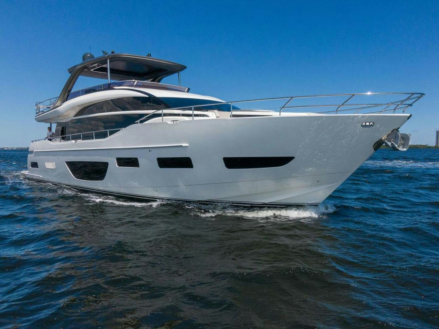 a white yacht in the water aboard HIDEOUT Yacht for Sale