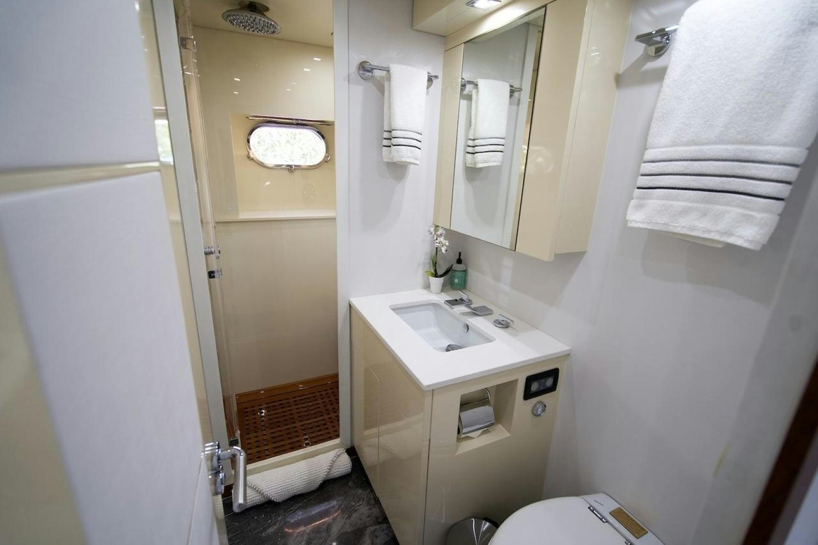a bathroom with a sink and toilet aboard U WISH Yacht for Sale