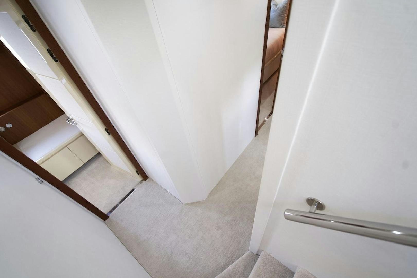 a white door with a handle aboard U WISH Yacht for Sale