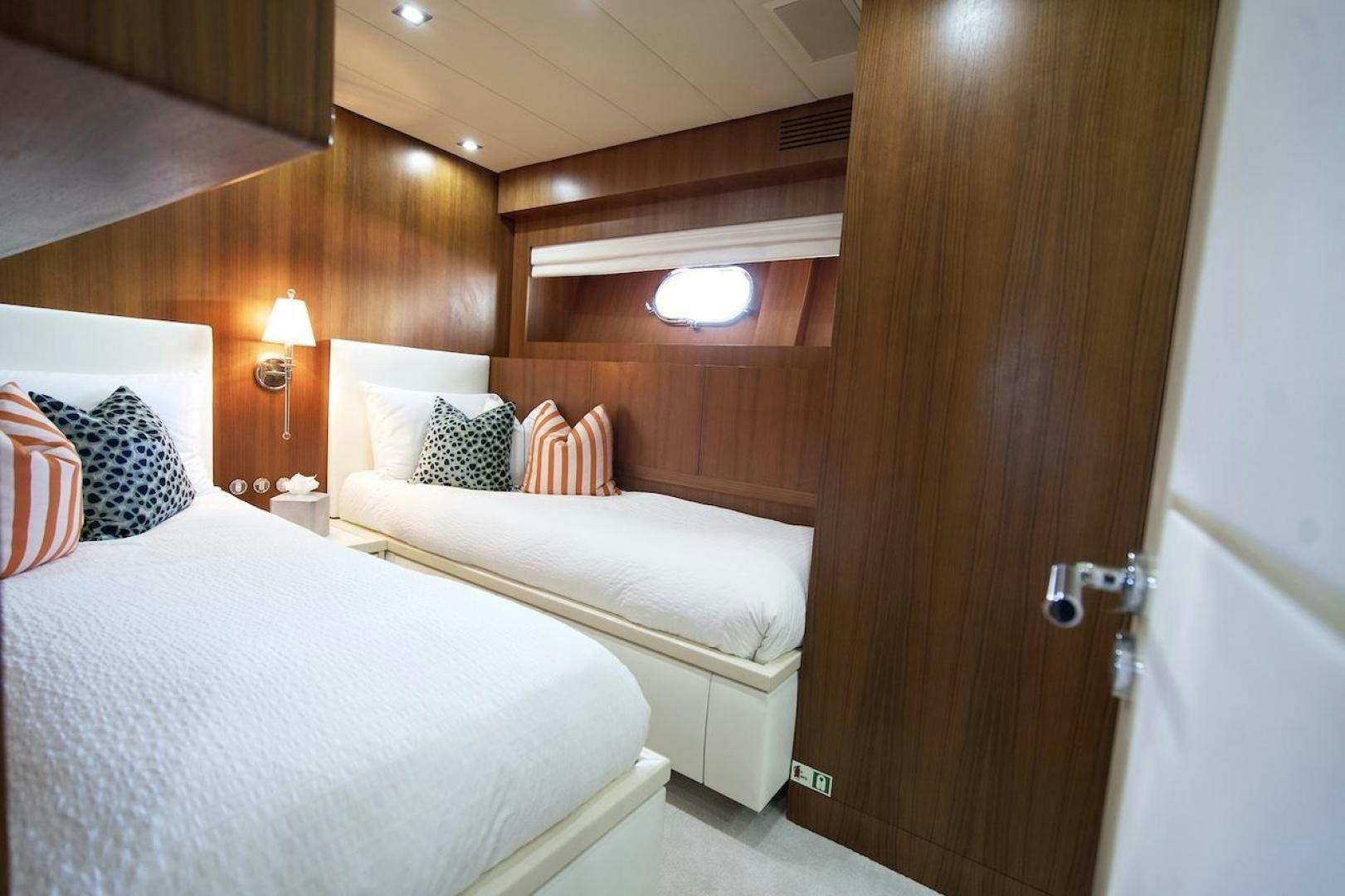 a room with two beds aboard U WISH Yacht for Sale