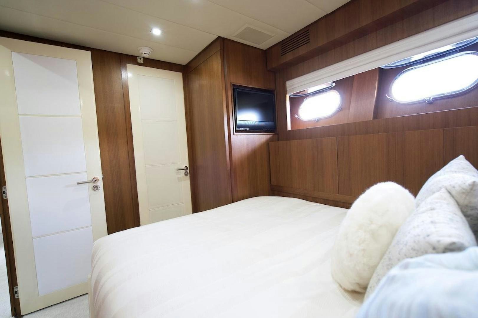 a bed in a room aboard U WISH Yacht for Sale