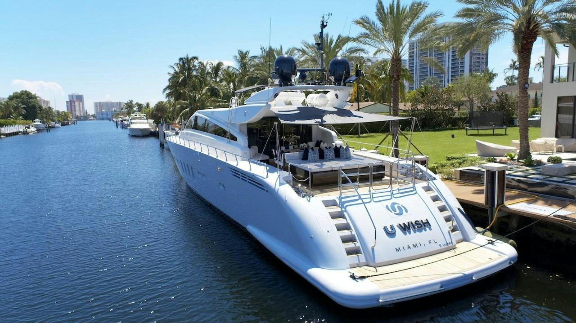 a boat docked at a pier aboard U WISH Yacht for Sale