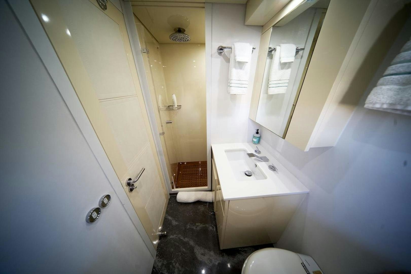 a bathroom with a sink and a toilet aboard U WISH Yacht for Sale