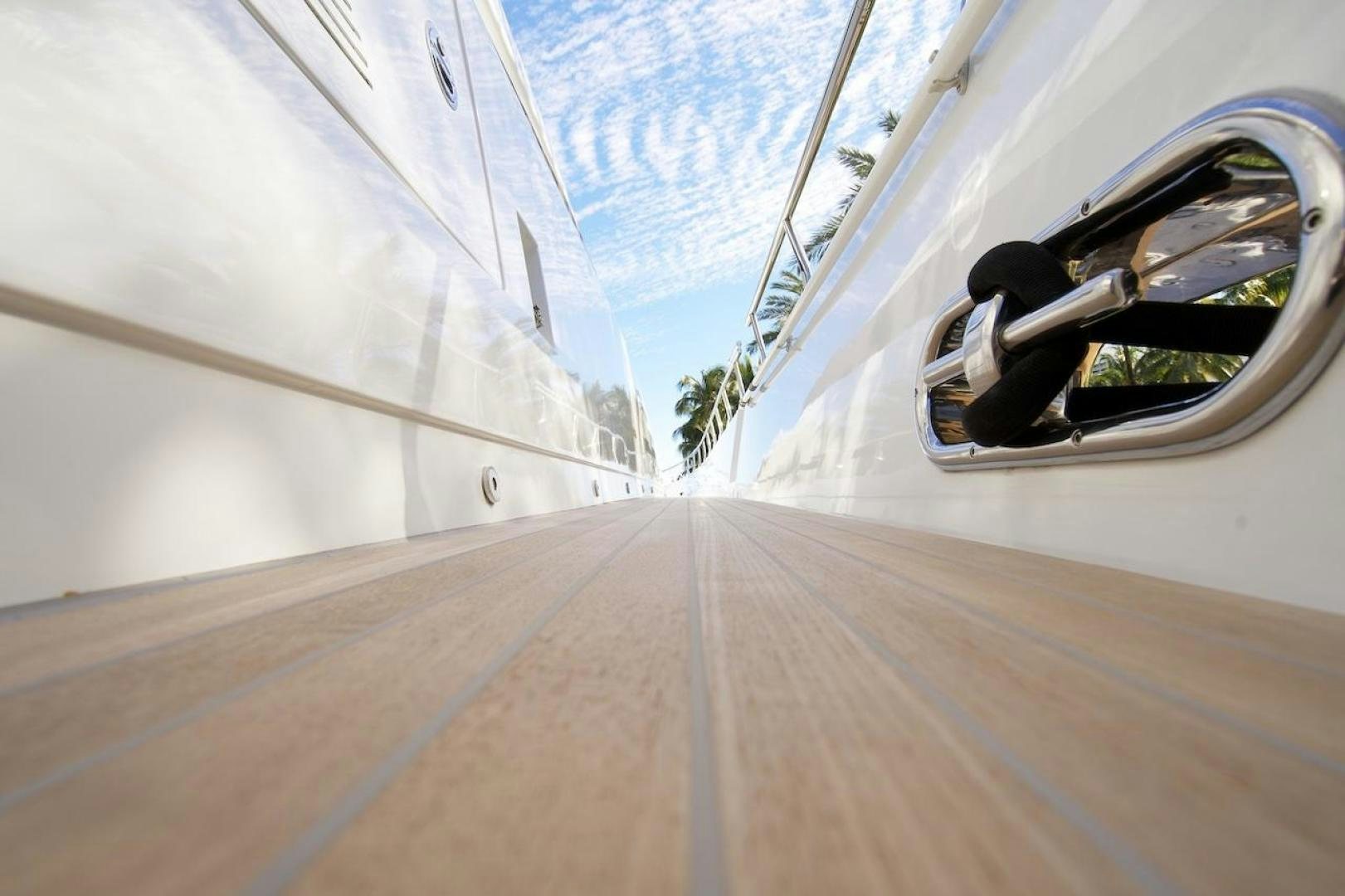 a view of a plane wing and a car aboard U WISH Yacht for Sale