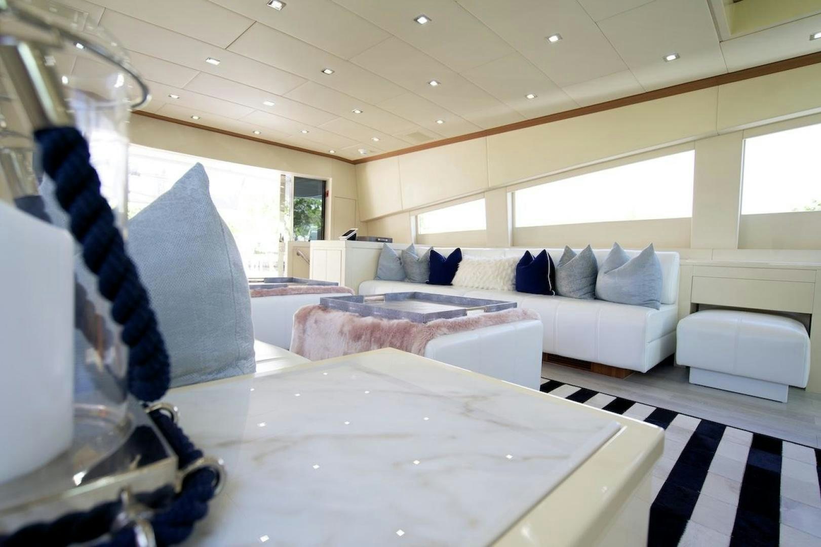 a room with a bed and a couch aboard U WISH Yacht for Sale