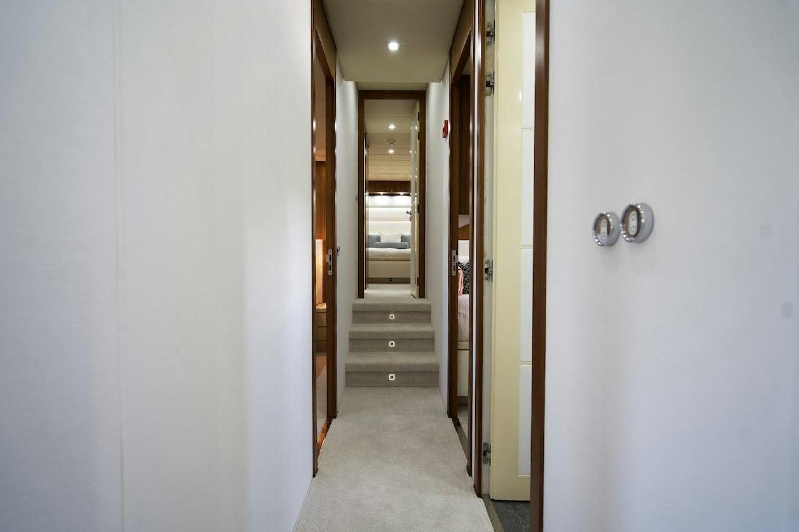 a hallway with doors aboard U WISH Yacht for Sale