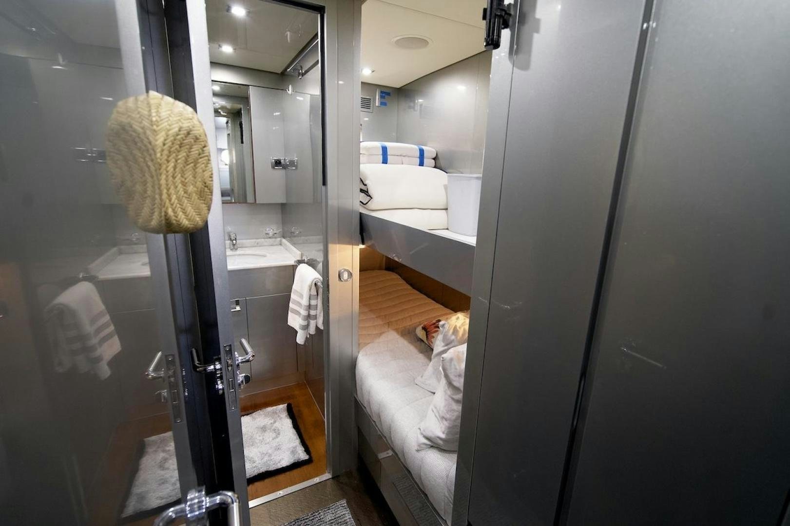 a bathroom with a large mirror aboard U WISH Yacht for Sale