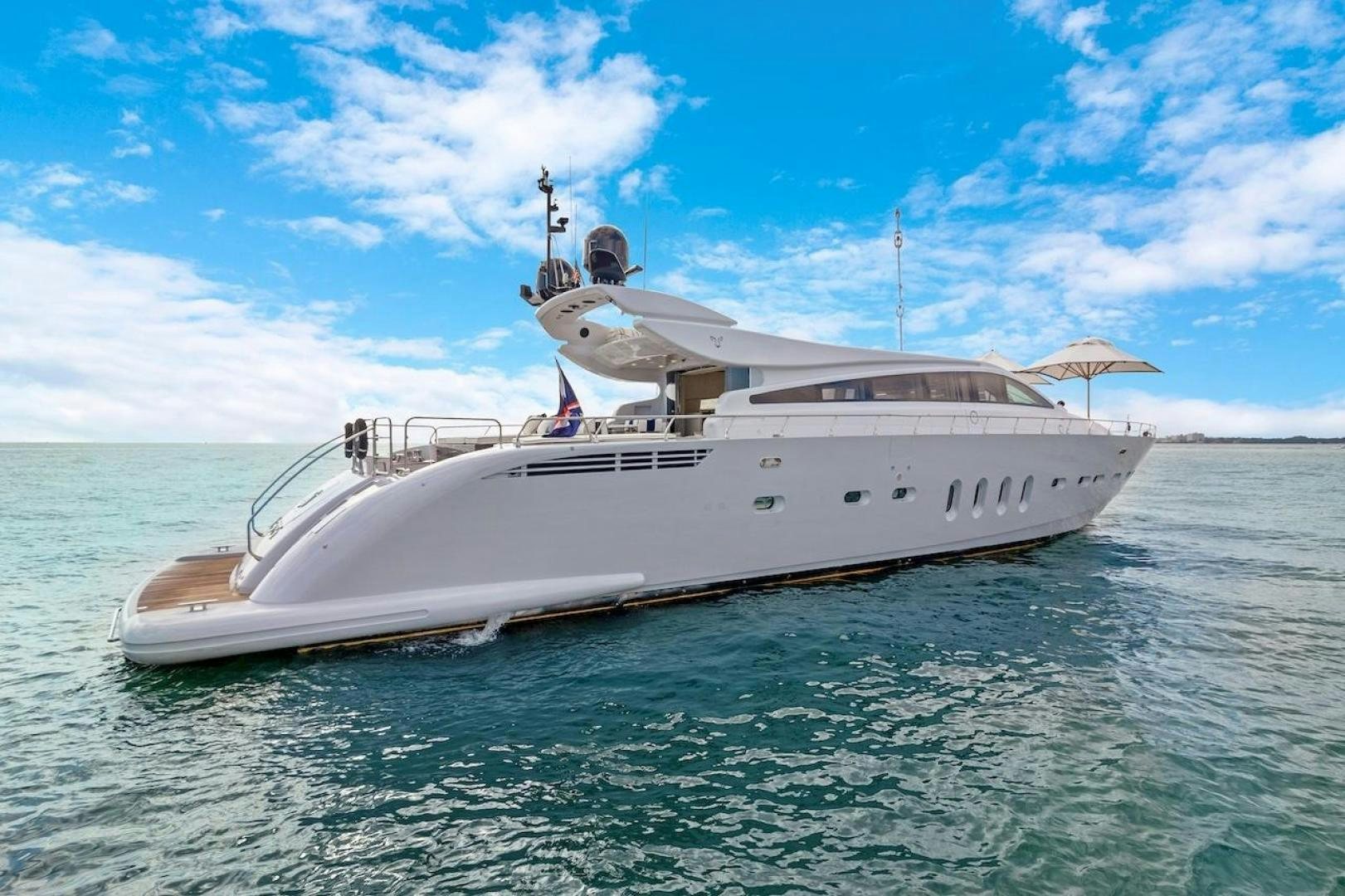 a white yacht in the water aboard U WISH Yacht for Sale