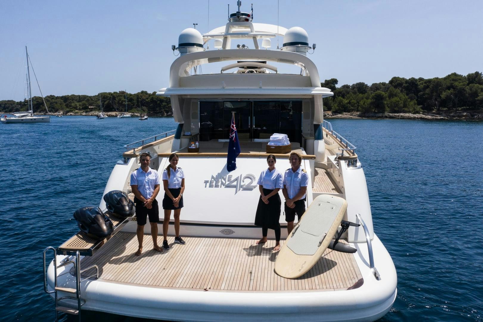 a group of people on a boat aboard MOKI Yacht for Sale