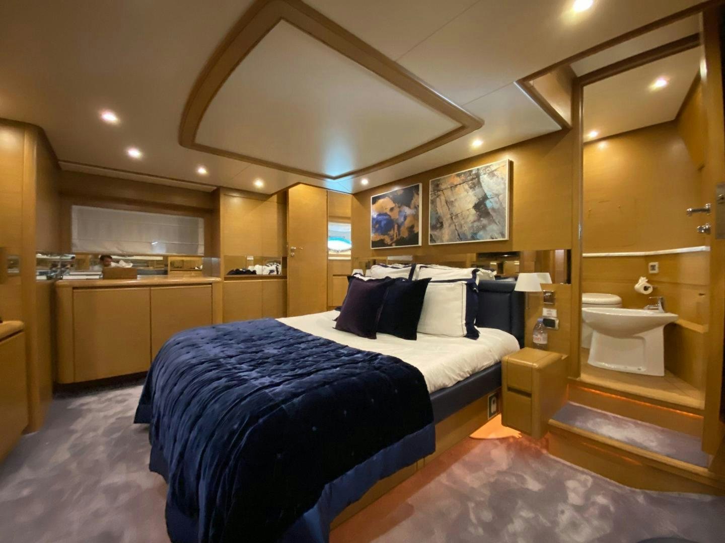 a room with two beds aboard MOKI Yacht for Sale