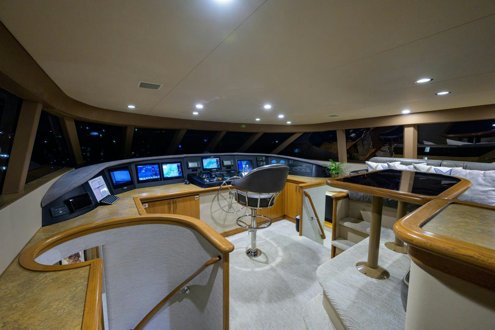a room with computers and desks aboard SUPERSTAR Yacht for Sale