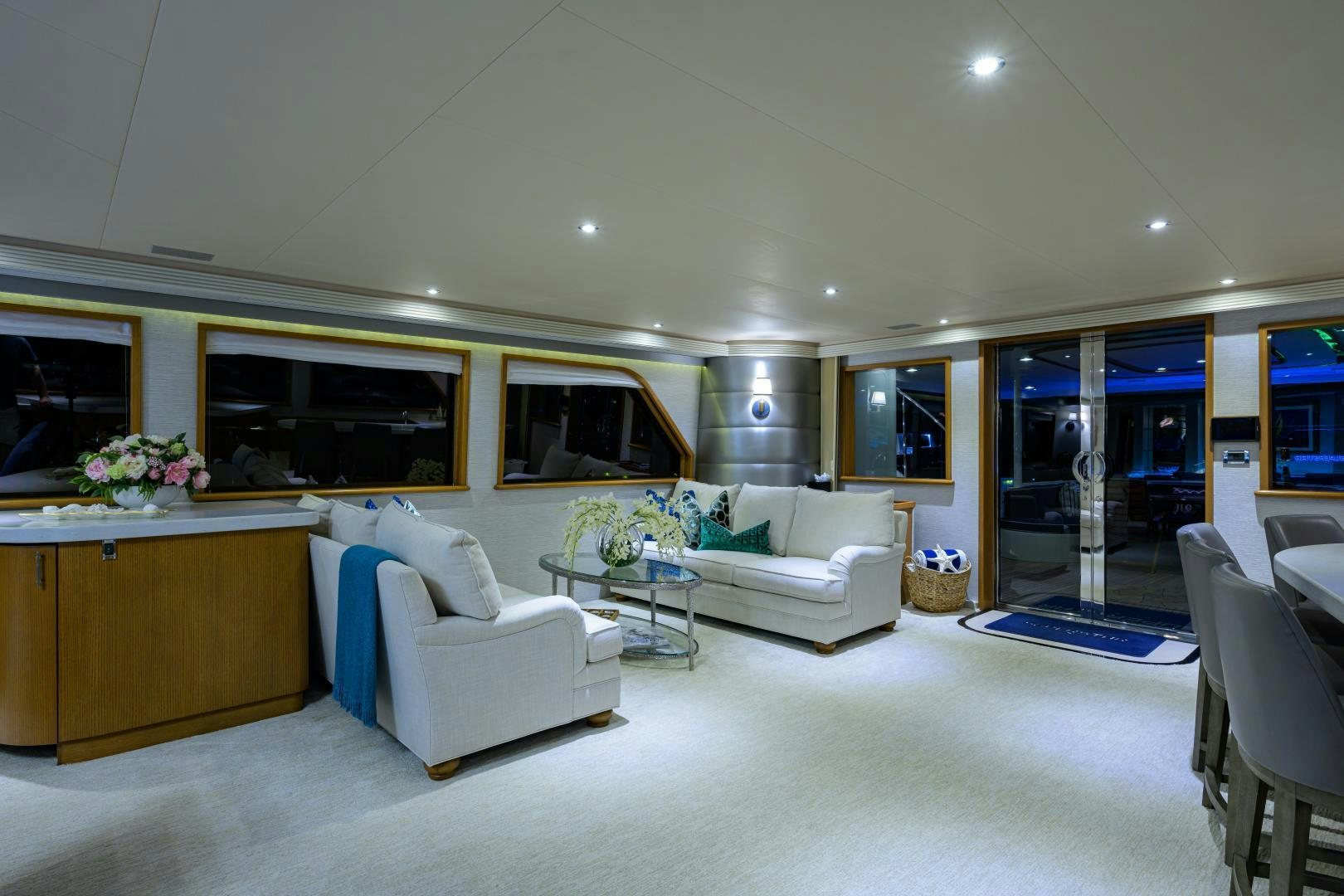 a room with a couch and a table aboard SUPERSTAR Yacht for Sale