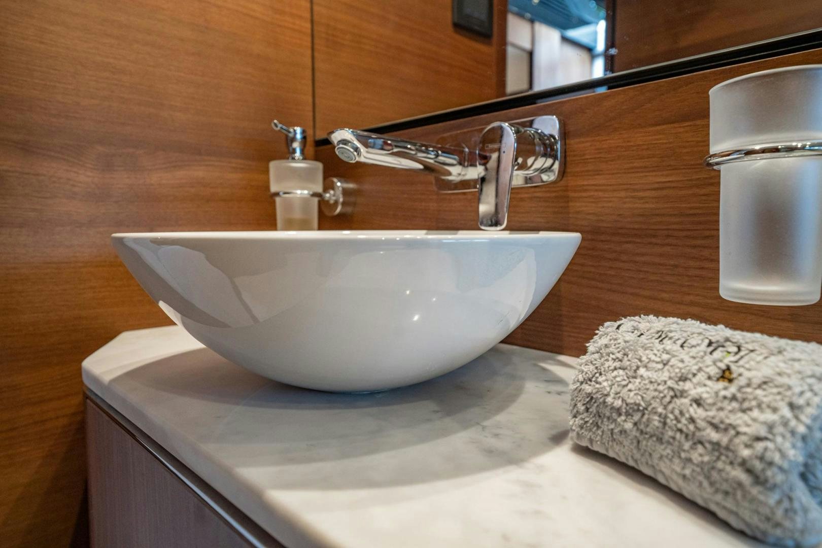 a sink with a towel aboard COCOON Yacht for Sale