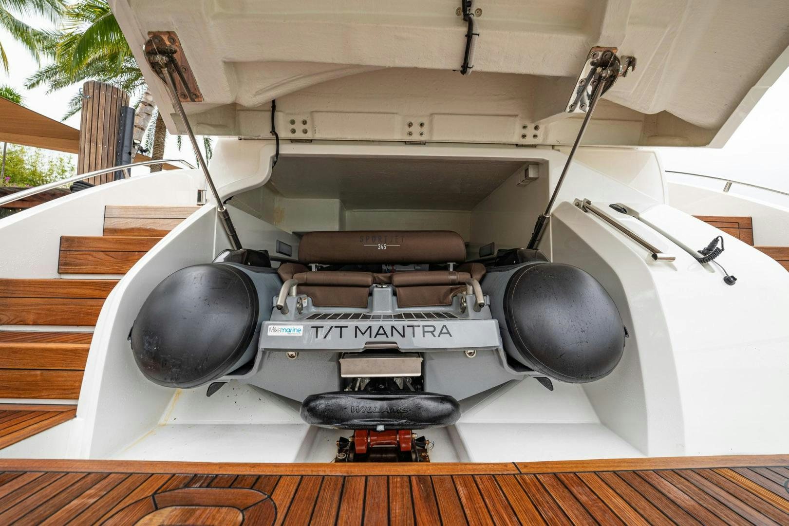 a white machine with a metal frame aboard COCOON Yacht for Sale