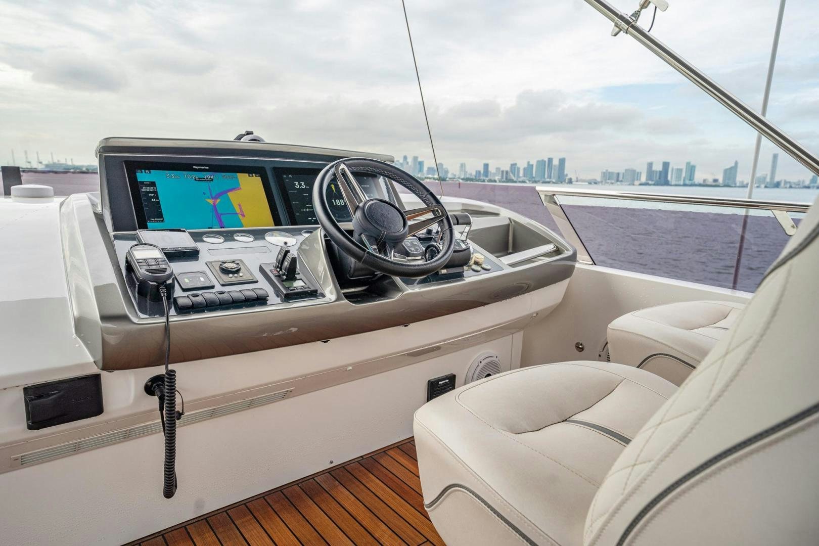a boat with a computer screen aboard COCOON Yacht for Sale