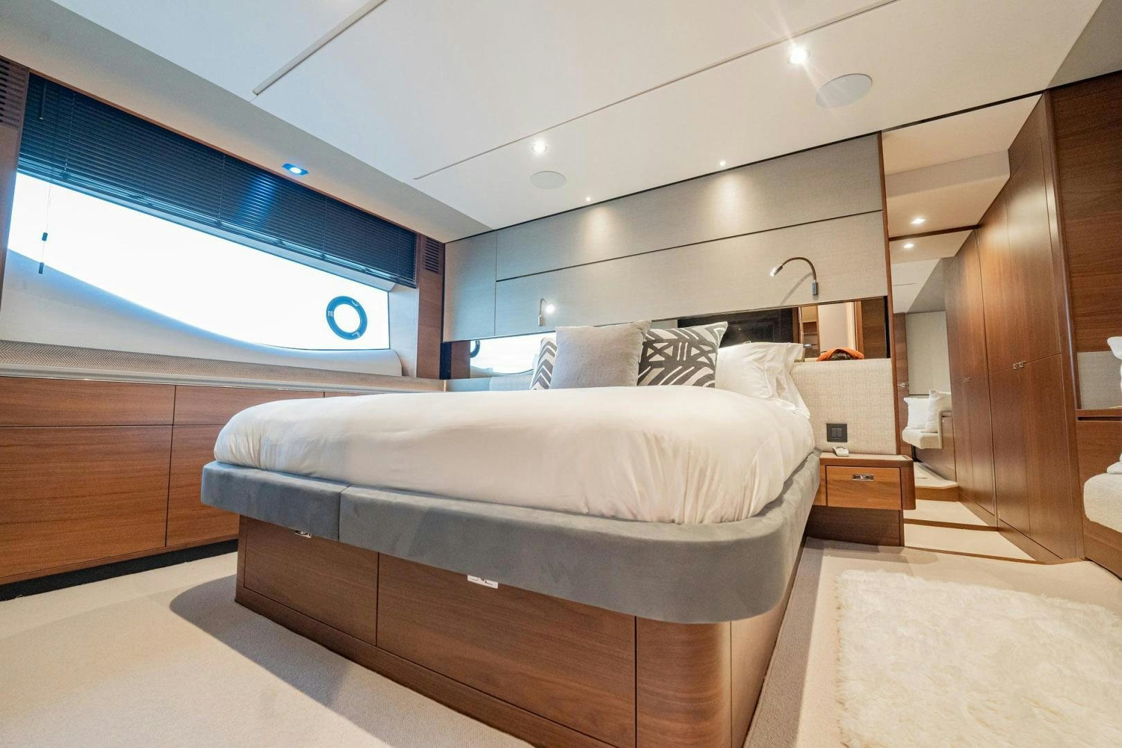 a bed in a room aboard COCOON Yacht for Sale