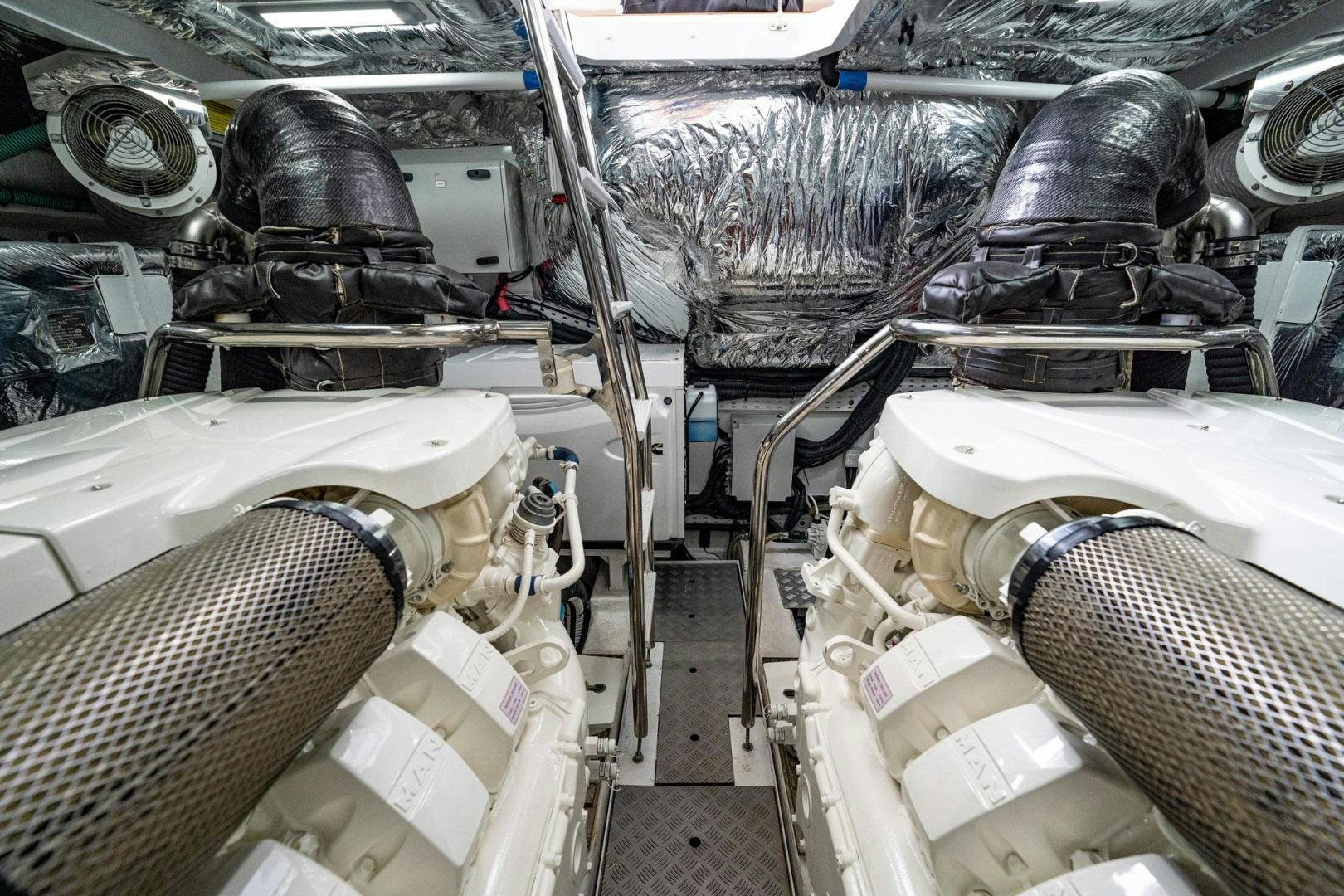 a close-up of a car engine aboard COCOON Yacht for Sale