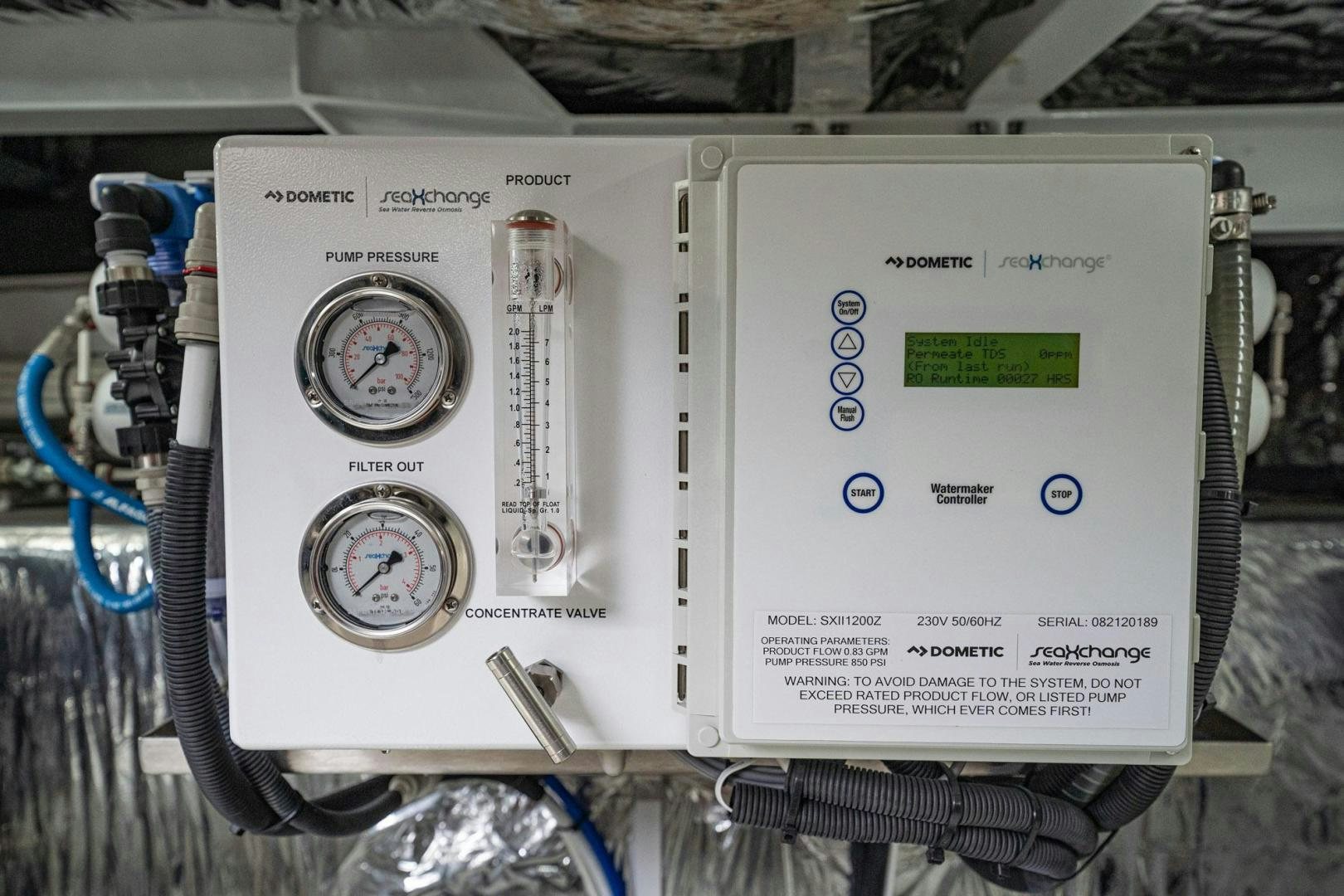 a white device with a screen aboard COCOON Yacht for Sale