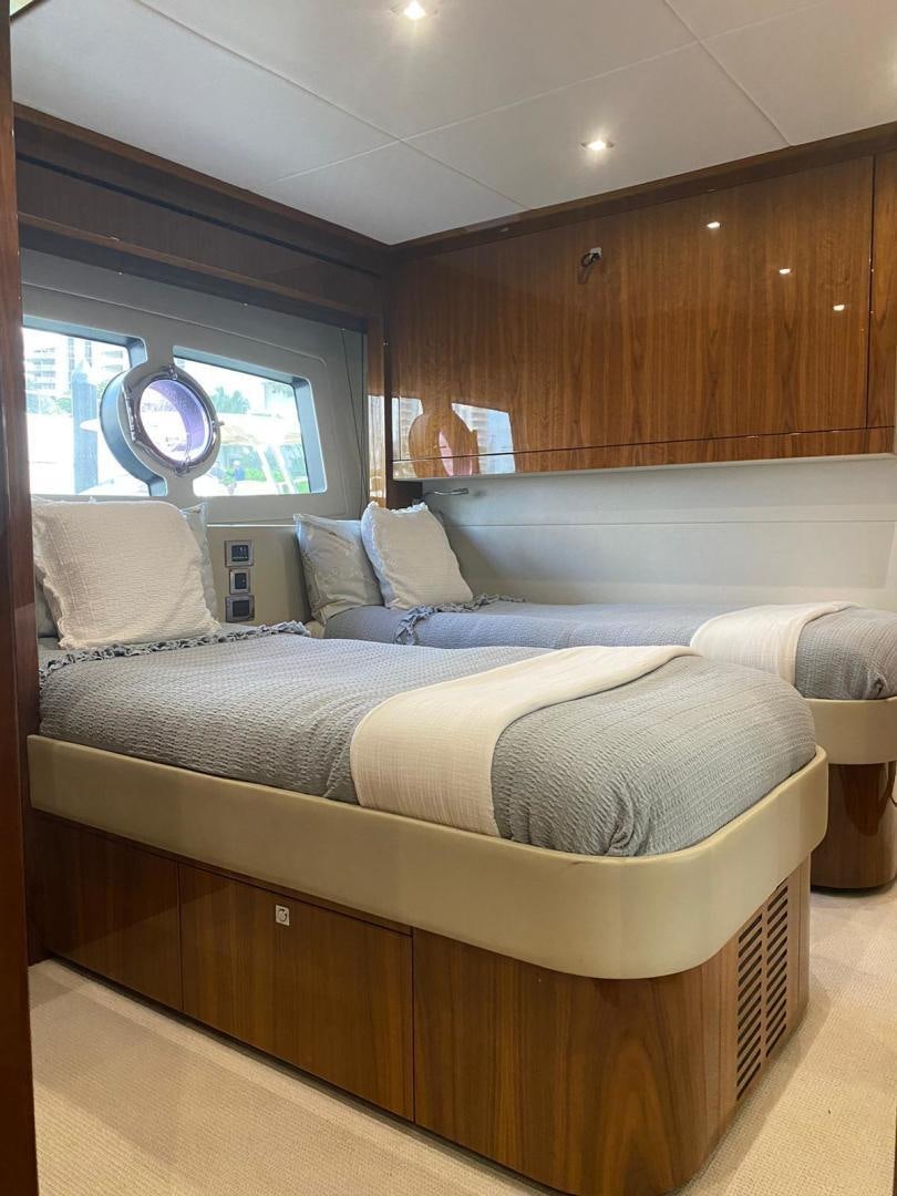 a bed in a room aboard RIII Yacht for Sale