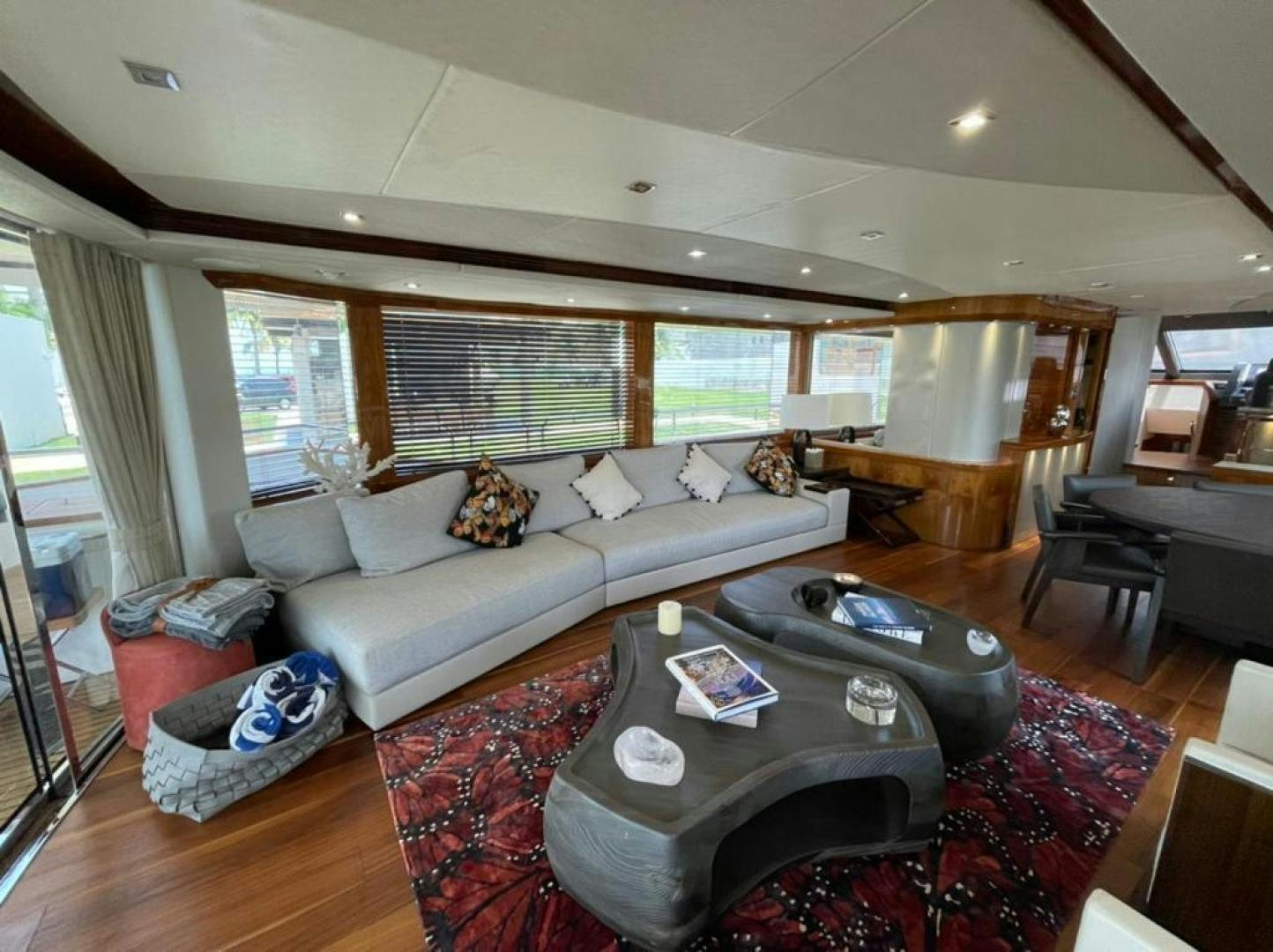 a living room with a couch and a coffee table aboard RIII Yacht for Sale