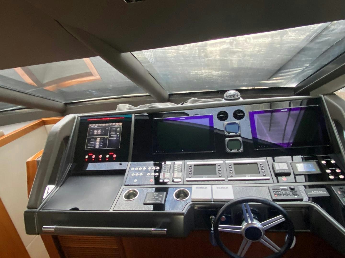 the inside of a car aboard RIII Yacht for Sale