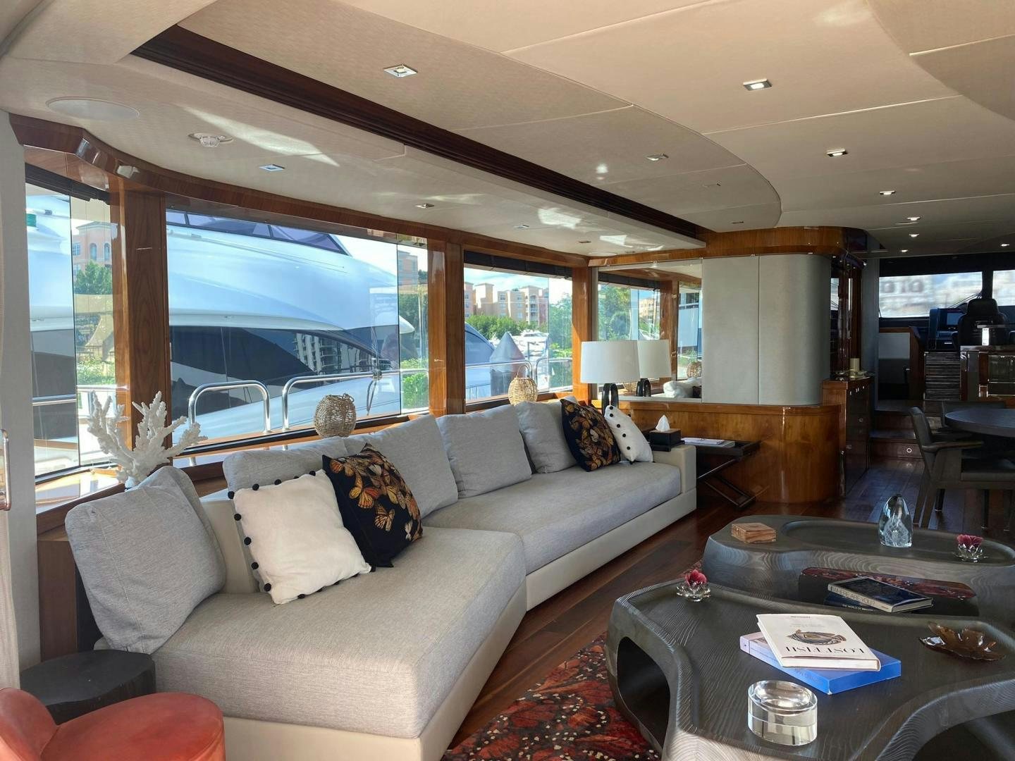 a living room with a large window aboard RIII Yacht for Sale