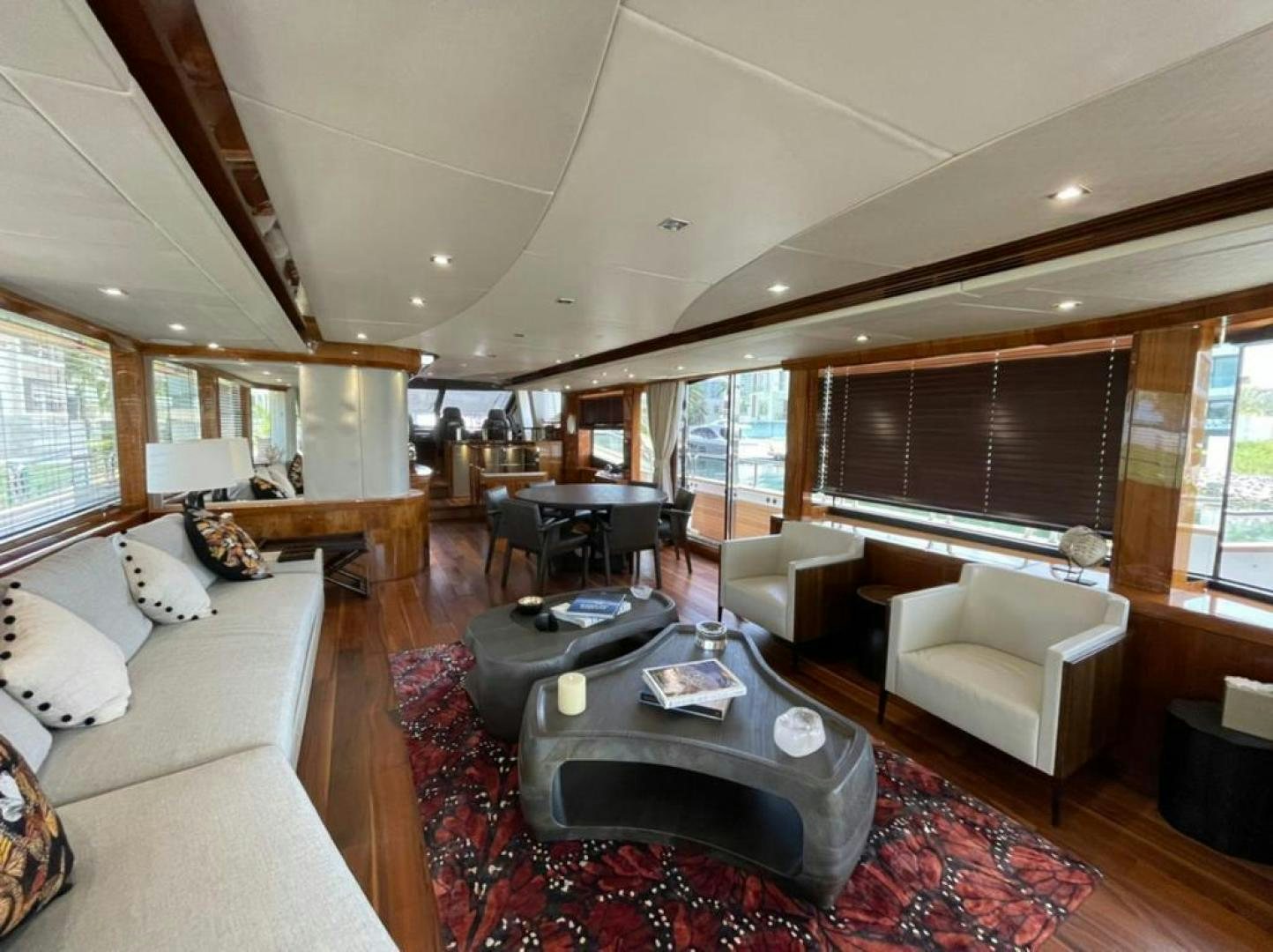 a living room with a couch and a coffee table aboard RIII Yacht for Sale