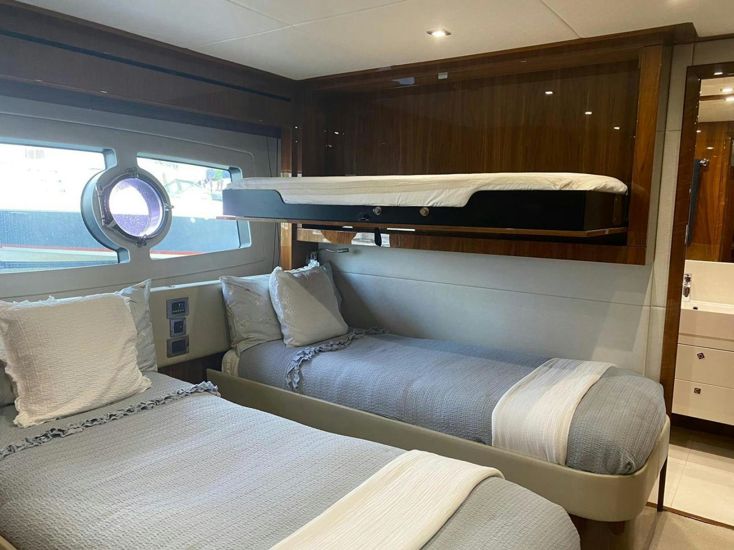 a bed in a room aboard RIII Yacht for Sale