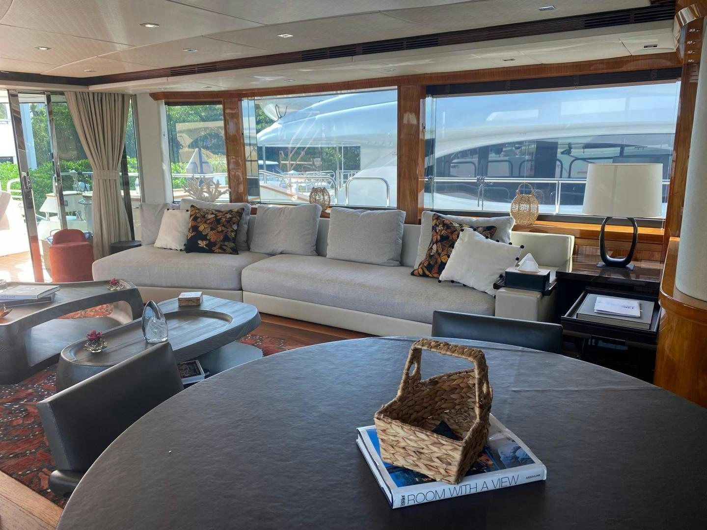 a living room with a couch and a coffee table aboard RIII Yacht for Sale