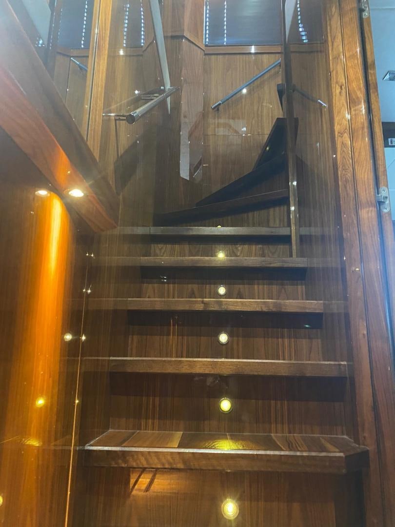 a glass case with a glass door aboard RIII Yacht for Sale