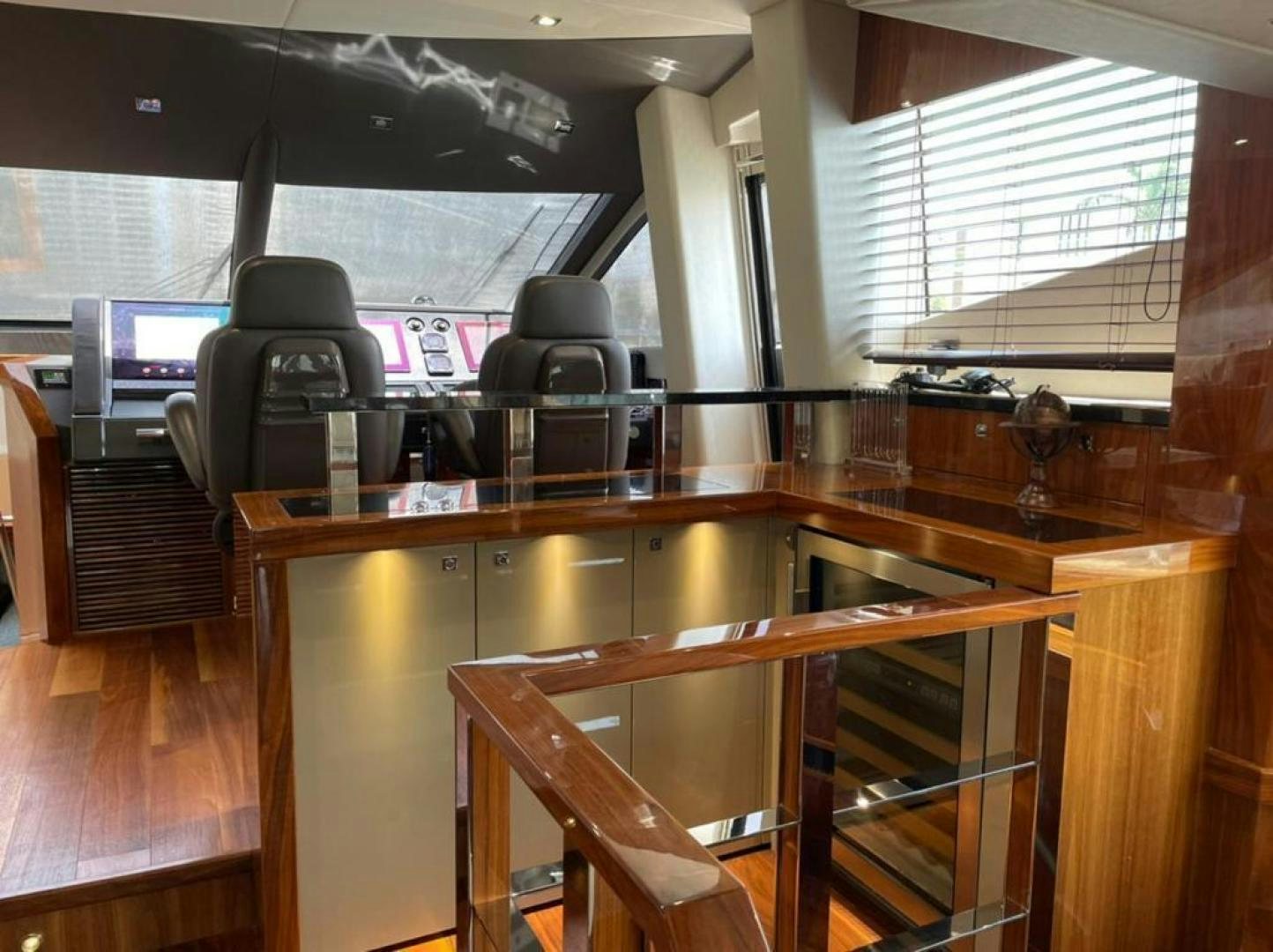a room with a desk and computer aboard RIII Yacht for Sale