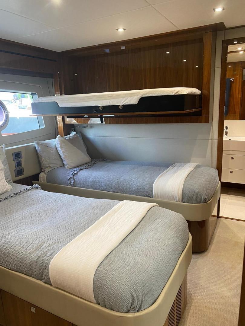 a bed in a room aboard RIII Yacht for Sale