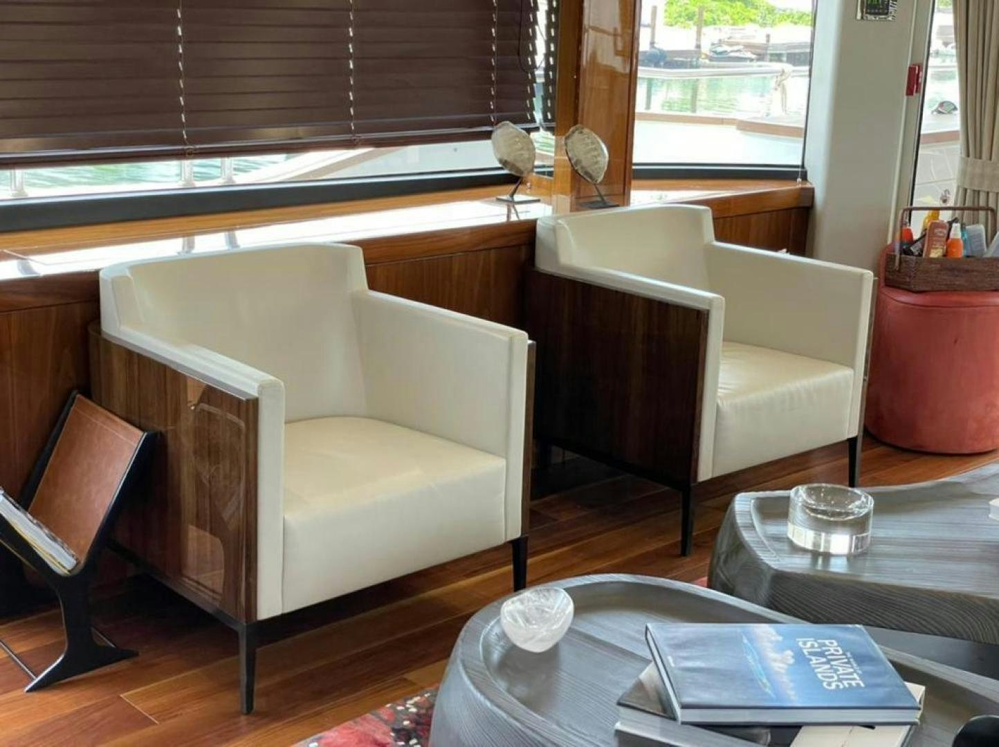 a room with a table and chairs aboard RIII Yacht for Sale