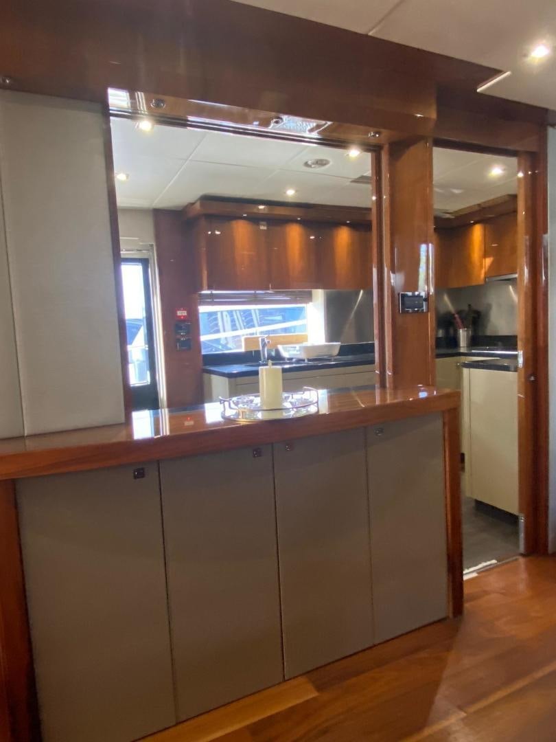 a kitchen with a large counter aboard RIII Yacht for Sale