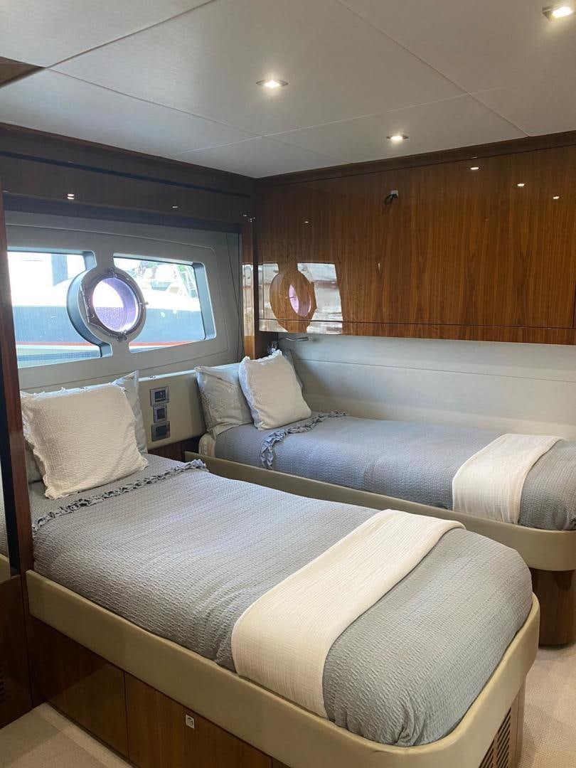 a room with a bed and a window aboard RIII Yacht for Sale