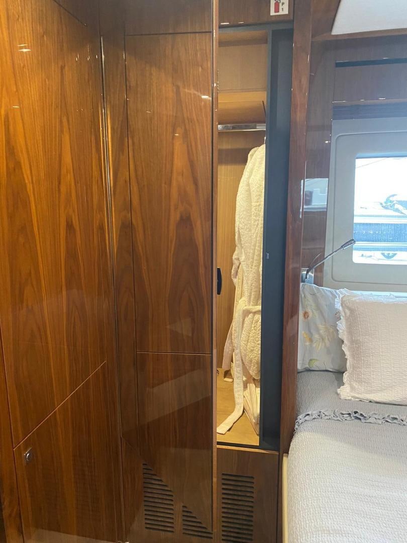 a wooden door with a window aboard RIII Yacht for Sale