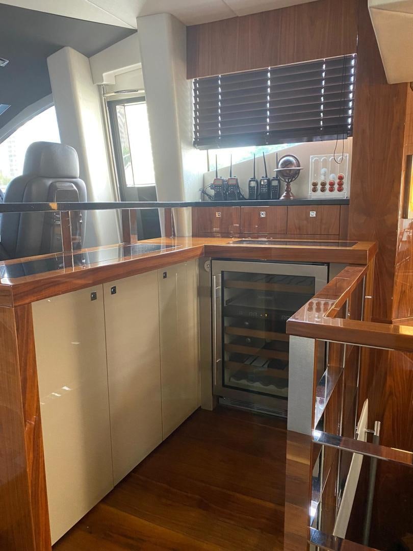 a kitchen with a stove and cabinets aboard RIII Yacht for Sale