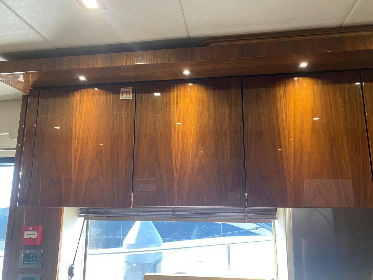 a wall with glass doors aboard RIII Yacht for Sale