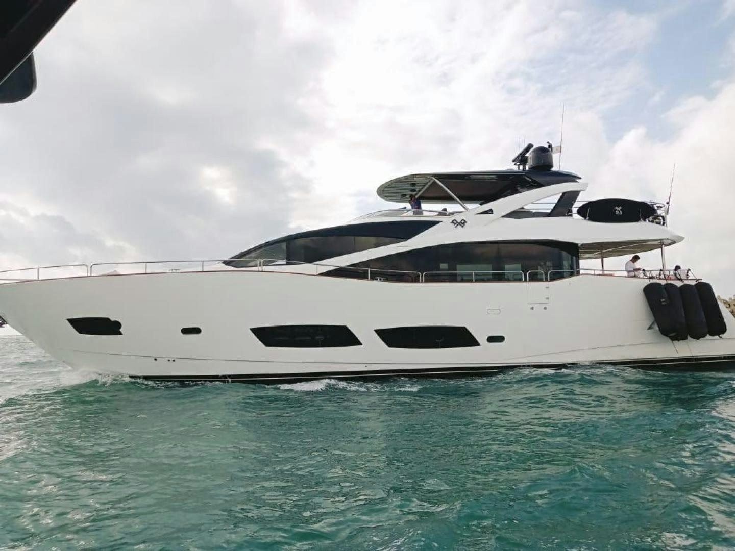 a white yacht in the water aboard RIII Yacht for Sale