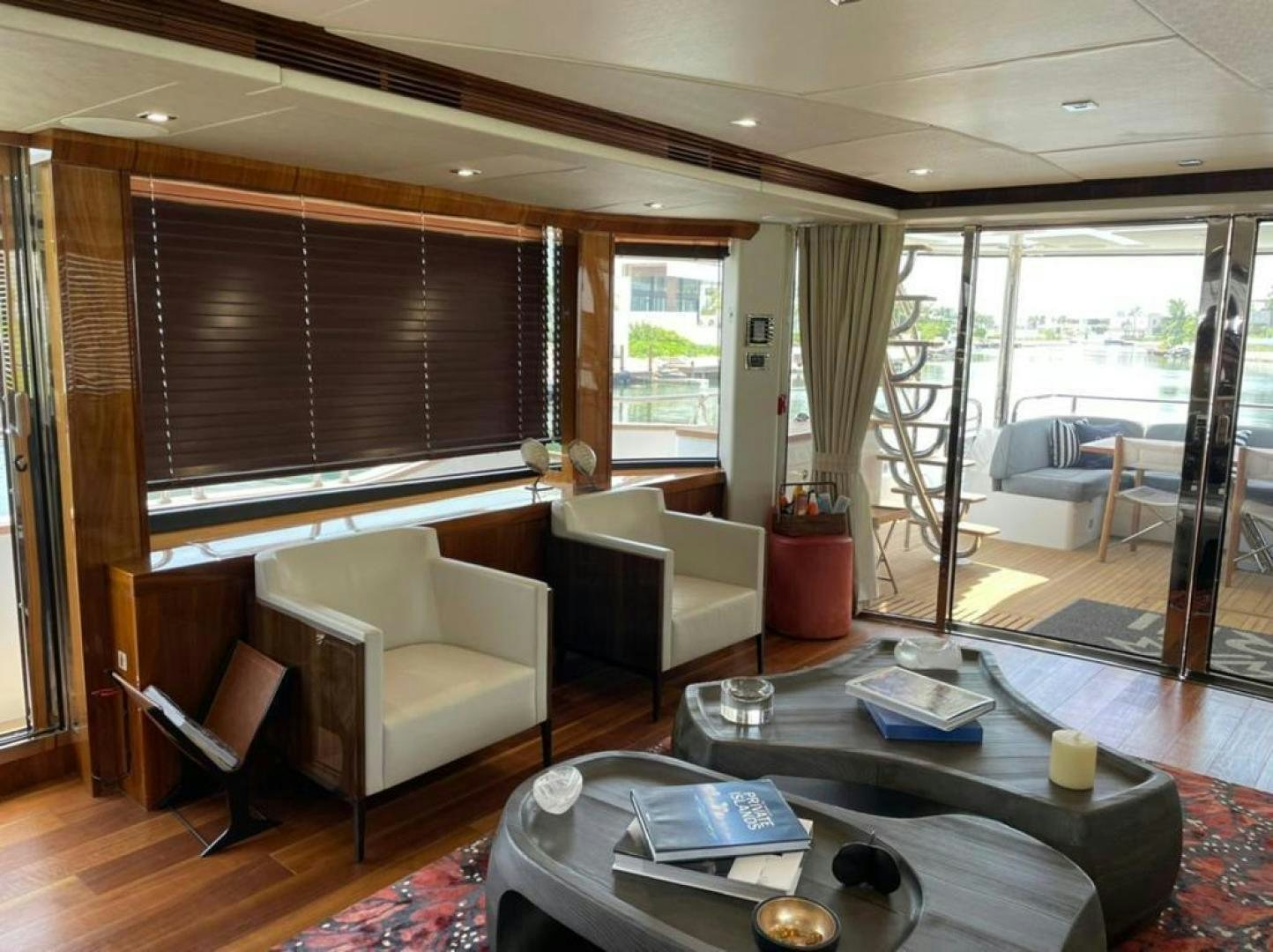 a living room with a large window aboard RIII Yacht for Sale