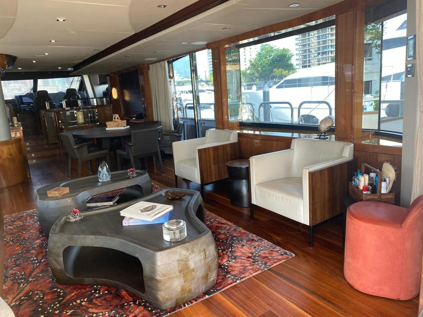 a living room with a large window aboard RIII Yacht for Sale