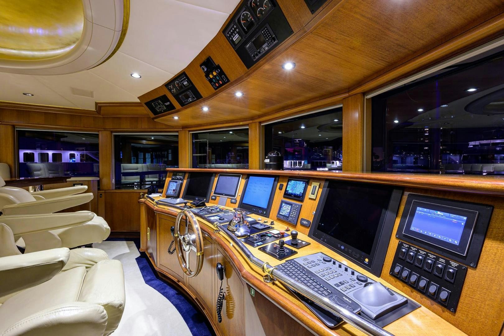 a room with computers and monitors aboard STARSHIP Yacht for Sale